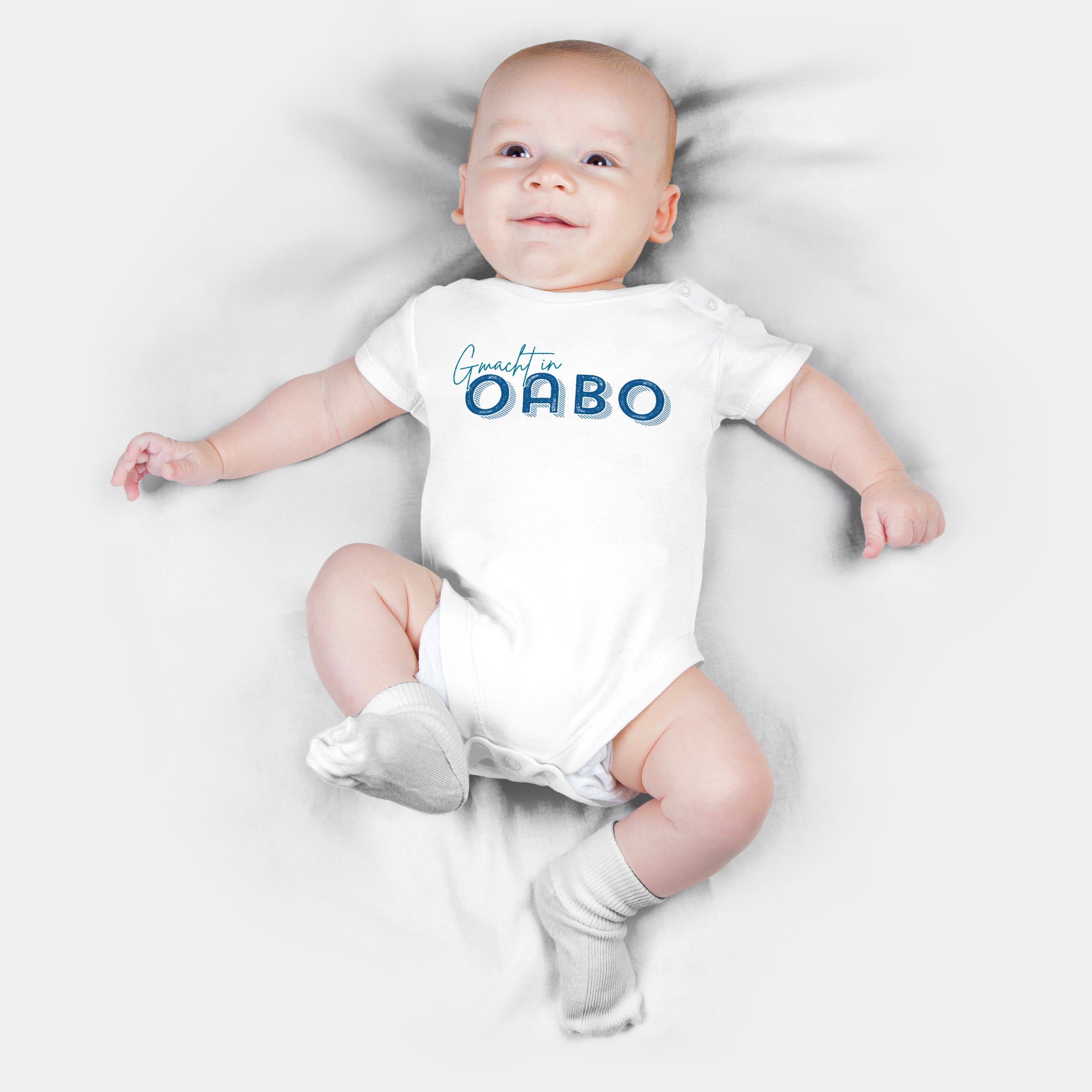 HEITER & LÄSSIG Baby-Body "Gamacht in Oabo" 62 / weiß - aus nachhaltiger und fairer Produktion